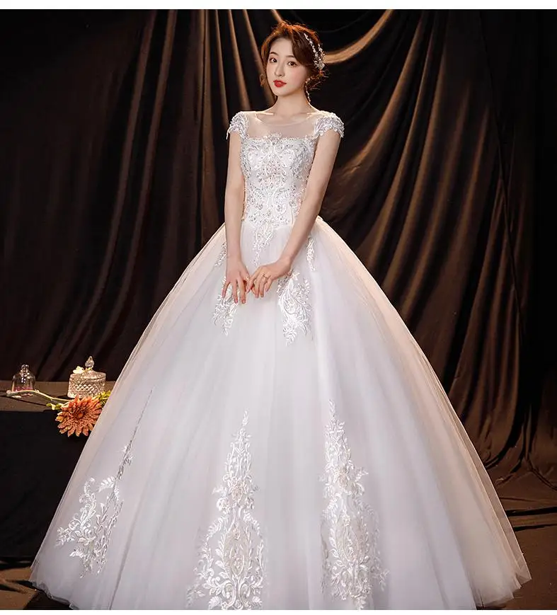 Real Photo Vintage Ball Gown O Neck White Tulle Bridal Dress Cap Sleeve Wedding Dresses Plus Size Long Appliques Pearls Marriage
Real Photo Vintage Ball Gown O Neck White Tulle Bridal Dress Cap Sleeve Wedding Dresses Plus Size Long Appliques Pearls Marriage