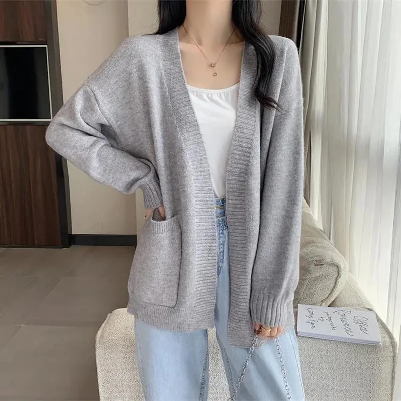 Loose Long Sleeve Knitted Cardigans Women 2023 Autumn Winter Solid Color V Neck Sweaters Coats Woman All Match Pocket Knitwear
Loose Long Sleeve Knitted Cardigans Women 2023 Autumn Winter Solid Color V Neck Sweaters Coats Woman All Match Pocket Knitwear