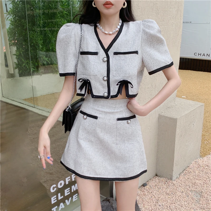 Summer New Women Two-piece Suit Casual V-Neck Crop Top And A-Line Skirt 2 Piece Set Womens Outfits
Summer New Women Two-piece Suit Casual V-Neck Crop Top And A-Line Skirt 2 Piece Set Womens Outfits