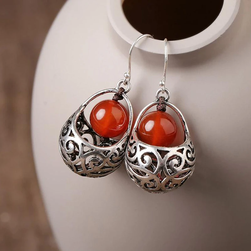 Original designer new ethnic style red round hollow earrings retro temperament exquisite luxury ladies silver jewelry
Original designer new ethnic style red round hollow earrings retro temperament exquisite luxury ladies silver jewelry