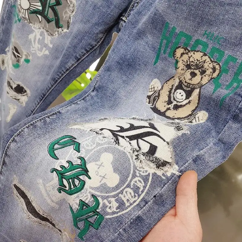 European station tide brand bear print jeans men's spring and summer light blue slim fit trousers youth casual
European station tide brand bear print jeans men's spring and summer light blue slim fit trousers youth casual