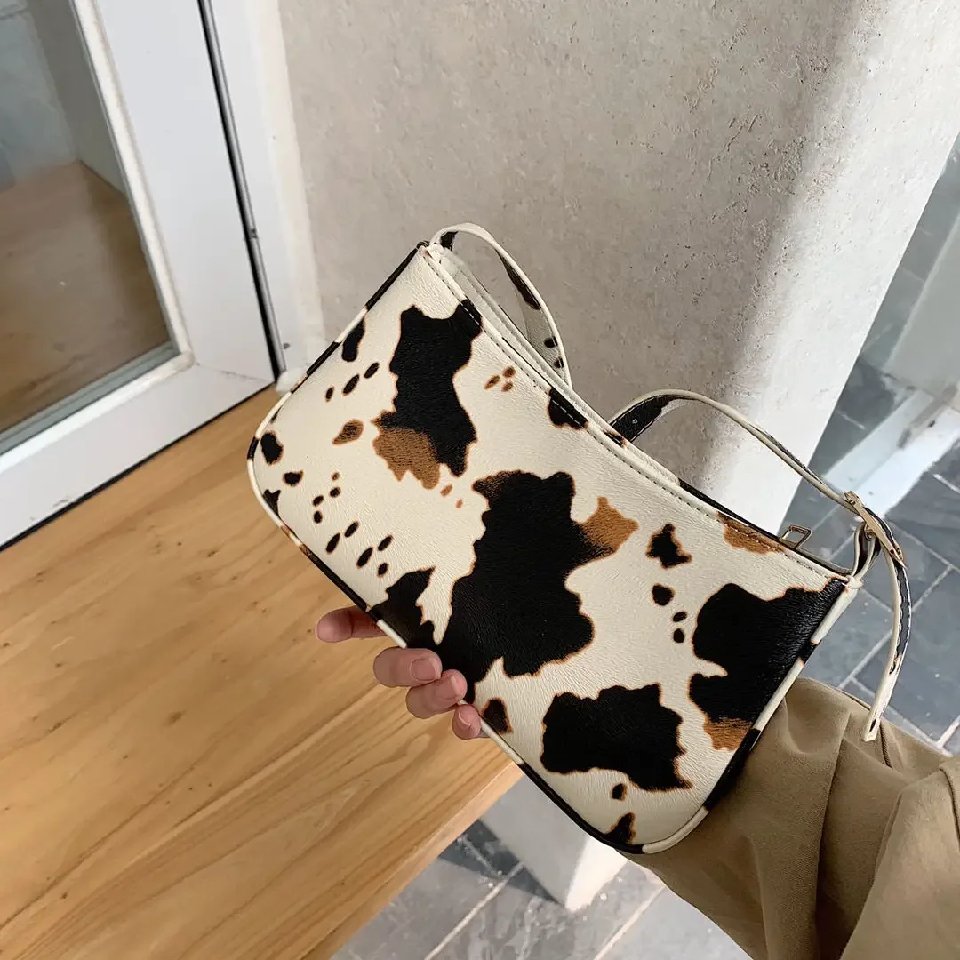 Milk Cow Print Handbags for Women 2022 Fashion High Quality Pu Leather Girls Shoulder Messenger Bags
Milk Cow Print Handbags for Women 2022 Fashion High Quality Pu Leather Girls Shoulder Messenger Bags
