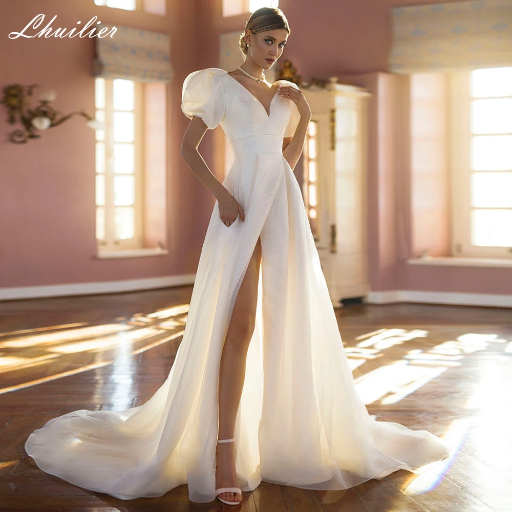 Женское ТРАПЕЦИЕВИДНОЕ свадебное платье Lhuilier из блестящего тюля с V-образным вырезом и рукавами-фонариками длиной до пола с высоким разрезом
Женское ТРАПЕЦИЕВИДНОЕ свадебное платье Lhuilier из блестящего тюля с V-образным вырезом и рукавами-фонариками длиной до пола с высоким разрезом