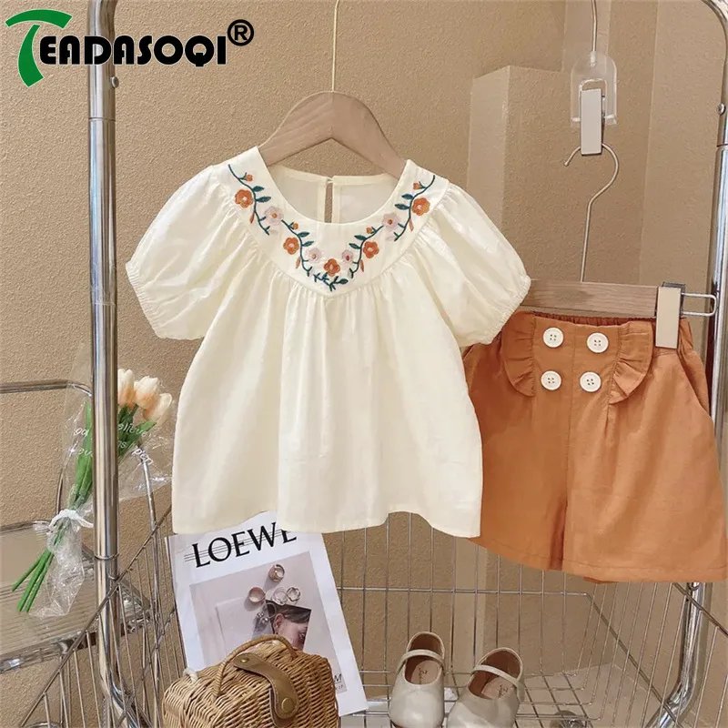 Summer New In Set 2pcs Kid Baby Girls Puff Sleeve Embroidery Flower Top T-shirts + Solid Ruched Shorts Children Fashion Clothing
Summer New In Set 2pcs Kid Baby Girls Puff Sleeve Embroidery Flower Top T-shirts + Solid Ruched Shorts Children Fashion Clothing