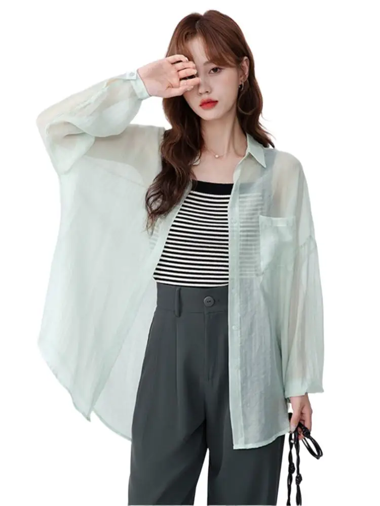 Fashion Casual Solid Shirt Rayon Lapel Single Breasted Sunscreen Shirt Summer Women's Loose Street Coat Holiday Beach Shirt
Fashion Casual Solid Shirt Rayon Lapel Single Breasted Sunscreen Shirt Summer Women's Loose Street Coat Holiday Beach Shirt