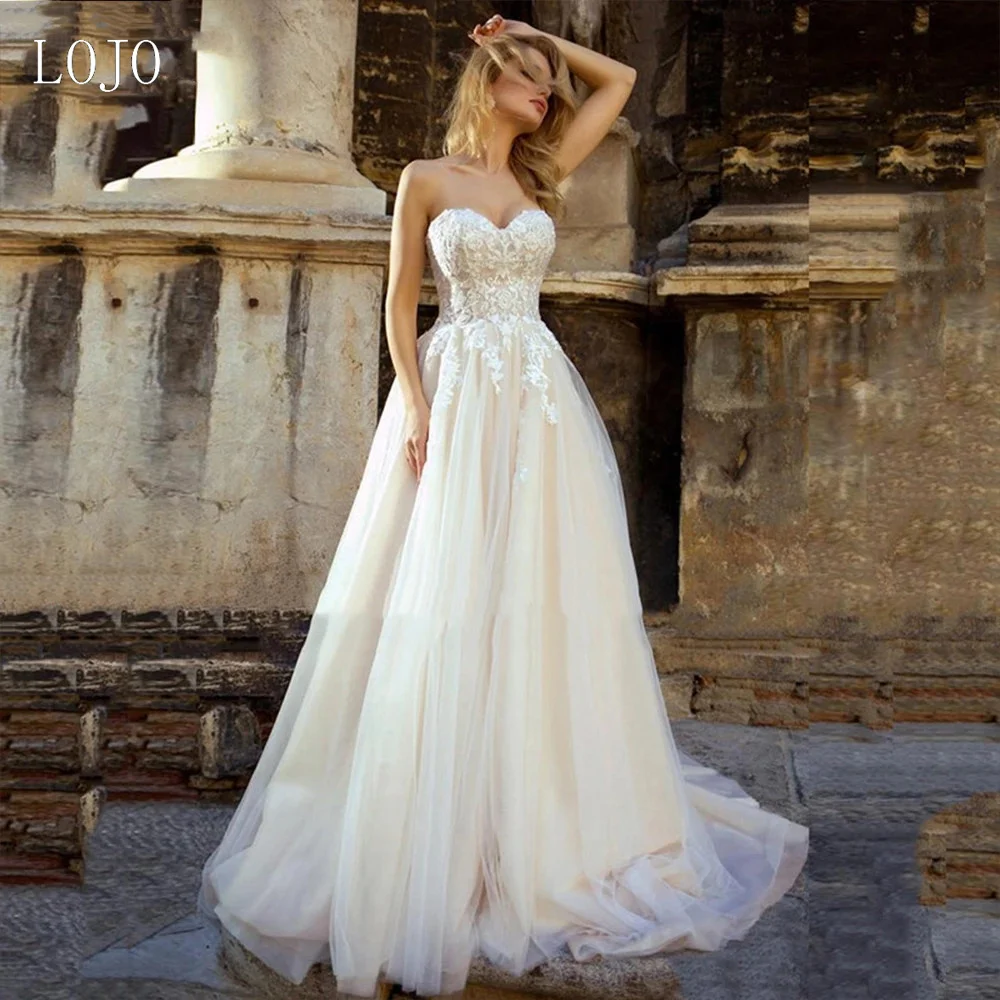 LOJO wd143 Boho Sweetheart Tulle Wedding Dress Lace Appliques A-Line Princess Backless Bridal Gown
LOJO wd143 Boho Sweetheart Tulle Wedding Dress Lace Appliques A-Line Princess Backless Bridal Gown