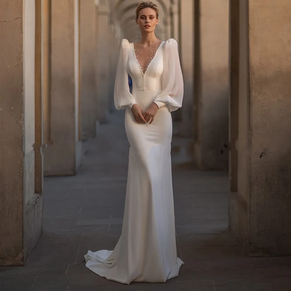 Modern Mermaid Wedding Dress Ladies Chic V-Neck Beads Crystal Long Puff Sleeve Sexy Backless Bridal Gowns Vestidos De Noiva
Modern Mermaid Wedding Dress Ladies Chic V-Neck Beads Crystal Long Puff Sleeve Sexy Backless Bridal Gowns Vestidos De Noiva