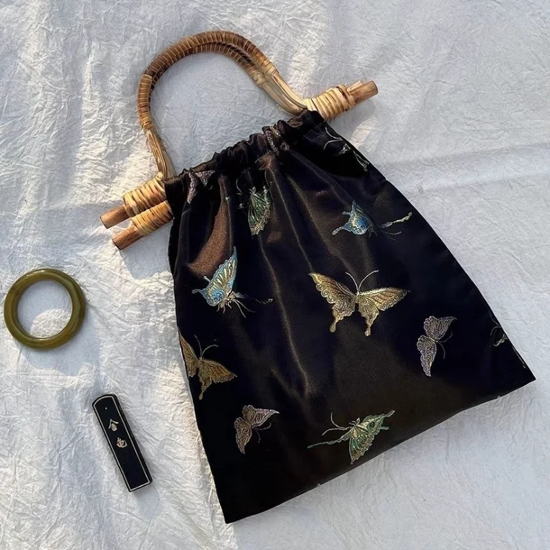 2023 New Chinese Style Bamboo Handle Handbag Black Gold Butterfly Embroidery Cheongsam Bag Women Black Tote Bag Sac A Main Femme
2023 New Chinese Style Bamboo Handle Handbag Black Gold Butterfly Embroidery Cheongsam Bag Women Black Tote Bag Sac A Main Femme