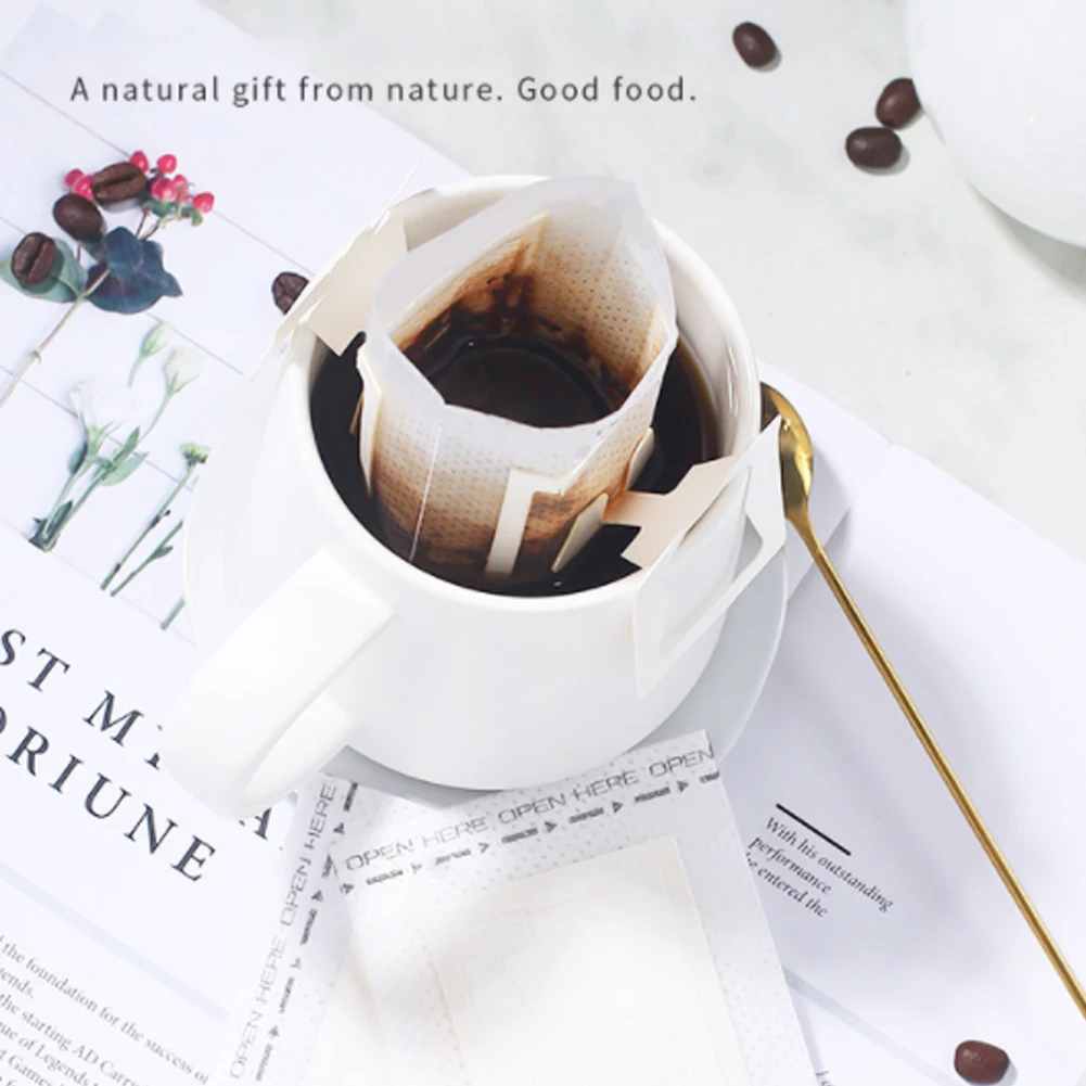 50Pcs/Pack Disposable Coffee Fliter Bags Portable Hanging Ear Style Coffee Filters Eco-Friendly Paper Bag For Espresso Coffee
50Pcs/Pack Disposable Coffee Fliter Bags Portable Hanging Ear Style Coffee Filters Eco-Friendly Paper Bag For Espresso Coffee