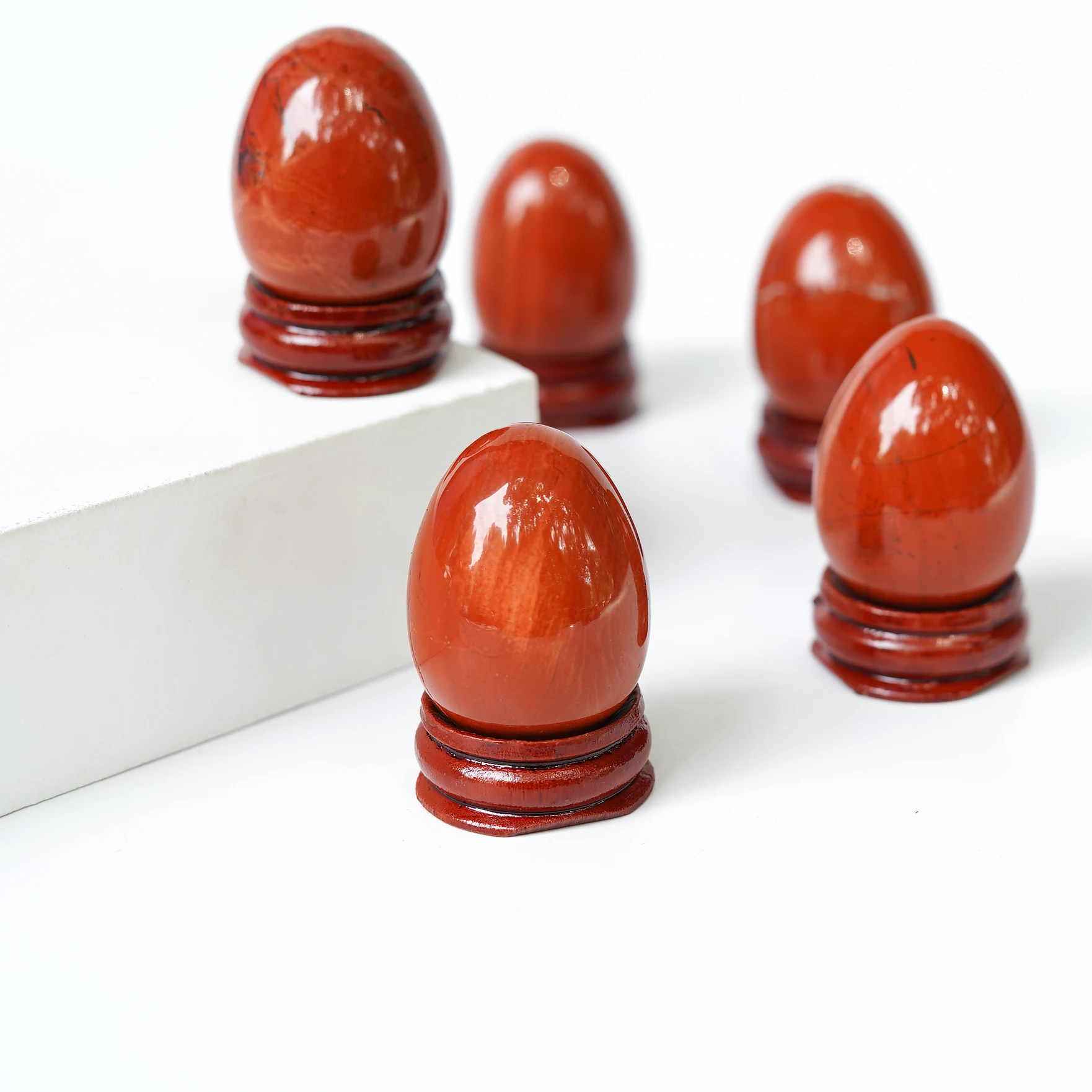 

2023 40*30mm Natural Red Jasper Crystal Eggs With Wood Stand Gemstone Bell Chakra Healing Reiki Stone Carved Crafts