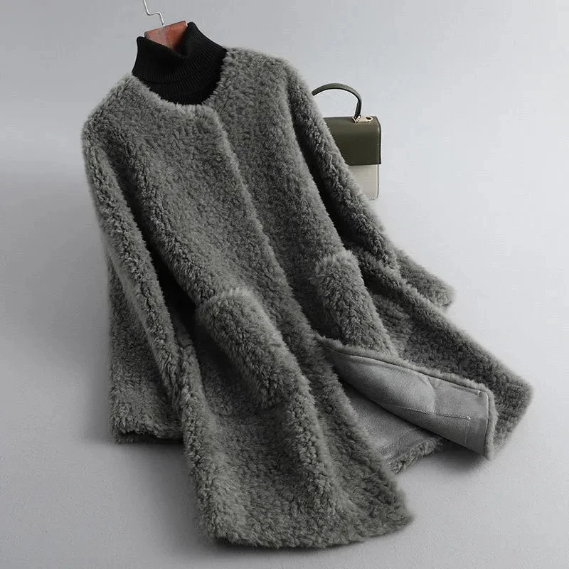 2022 New Faux Fur Lamb Coat Women Clothing Pocket O Neck Mid-Length Outerwear Autumn Winter Fashion Loose Solid Jacket
2022 New Faux Fur Lamb Coat Women Clothing Pocket O Neck Mid-Length Outerwear Autumn Winter Fashion Loose Solid Jacket