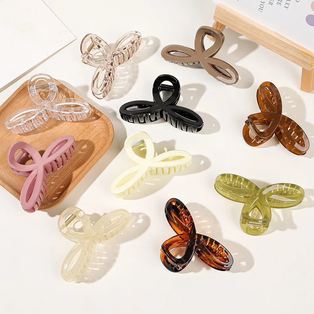 Fashion Clover Shape Hair Claw Solid Color Geometric Shark Hairpin Women Girl Transparent Crab Barrette Non-Slip Summer Headwear
Fashion Clover Shape Hair Claw Solid Color Geometric Shark Hairpin Women Girl Transparent Crab Barrette Non-Slip Summer Headwear