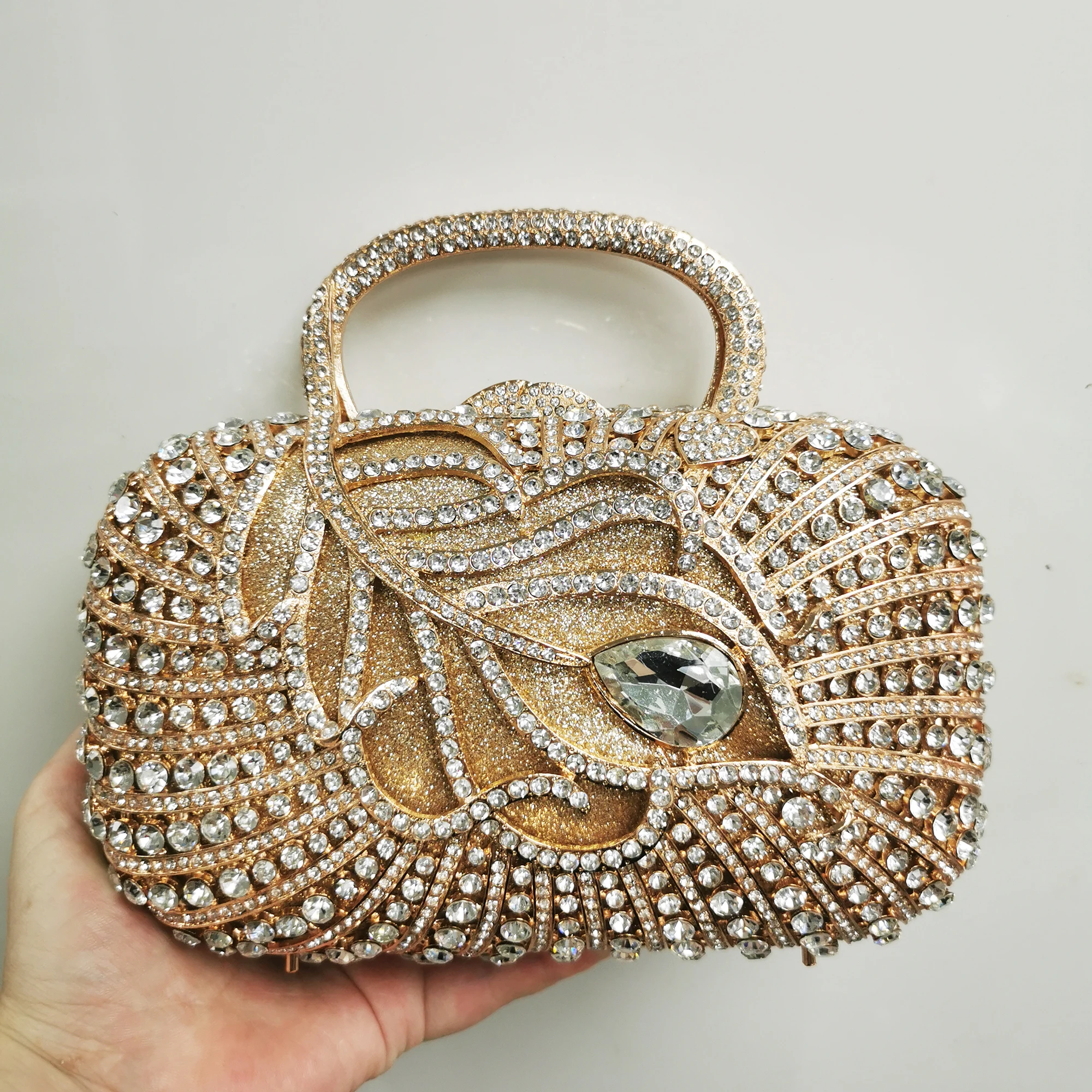 Woman Gold Silver Red Champagne AB Stone Dinner Purse Wedding Bridal Crystal Handbag Hollow Leaves Party Diamond Evening Bag 
Woman Gold Silver Red Champagne AB Stone Dinner Purse Wedding Bridal Crystal Handbag Hollow Leaves Party Diamond Evening Bag