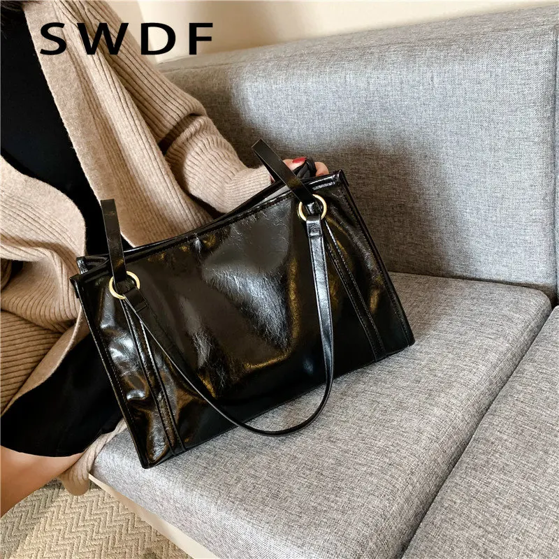 SWDF Women Oilskin Shoulder Bag Soft Women's Bag Portable Shopping Bag Women's Simple Leather Big Bag Casual Satchel Sac Bolsa
SWDF Women Oilskin Shoulder Bag Soft Women's Bag Portable Shopping Bag Women's Simple Leather Big Bag Casual Satchel Sac Bolsa