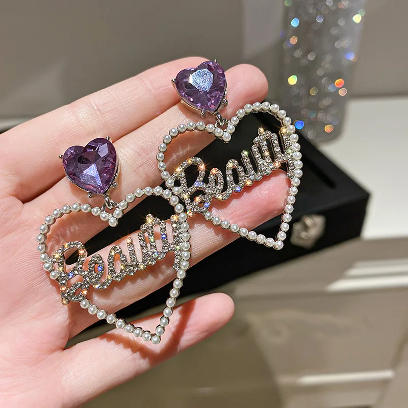 Origin Summer Korean Fashion Purple Love Heart Letter Dangle earrings for Women Exquisite Hollow Out earrings Jewelry Wholesale
Origin Summer Korean Fashion Purple Love Heart Letter Dangle earrings for Women Exquisite Hollow Out earrings Jewelry Wholesale