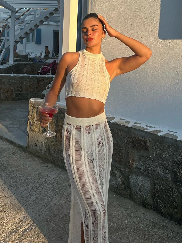 White Hollow Out Knitted Skirts Two Piece Sets Elegant Sexy Beach Dress Sets Women Summer Sleeveless Tops and Slim Maxi Skirts
White Hollow Out Knitted Skirts Two Piece Sets Elegant Sexy Beach Dress Sets Women Summer Sleeveless Tops and Slim Maxi Skirts