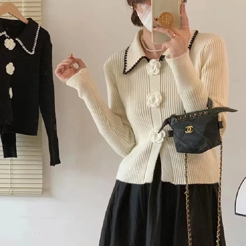 Korean simple wind lapel three-dimensional flower pullover sweater heavy foreign sweater woman
Korean simple wind lapel three-dimensional flower pullover sweater heavy foreign sweater woman
