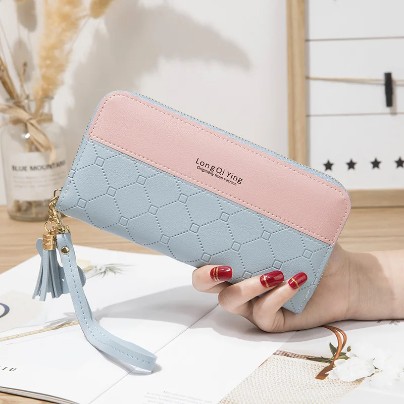 Dropshipping ladies zipper long wallet female students stitching contrast tassel handbag mobile phone bag coin purses
Dropshipping ladies zipper long wallet female students stitching contrast tassel handbag mobile phone bag coin purses