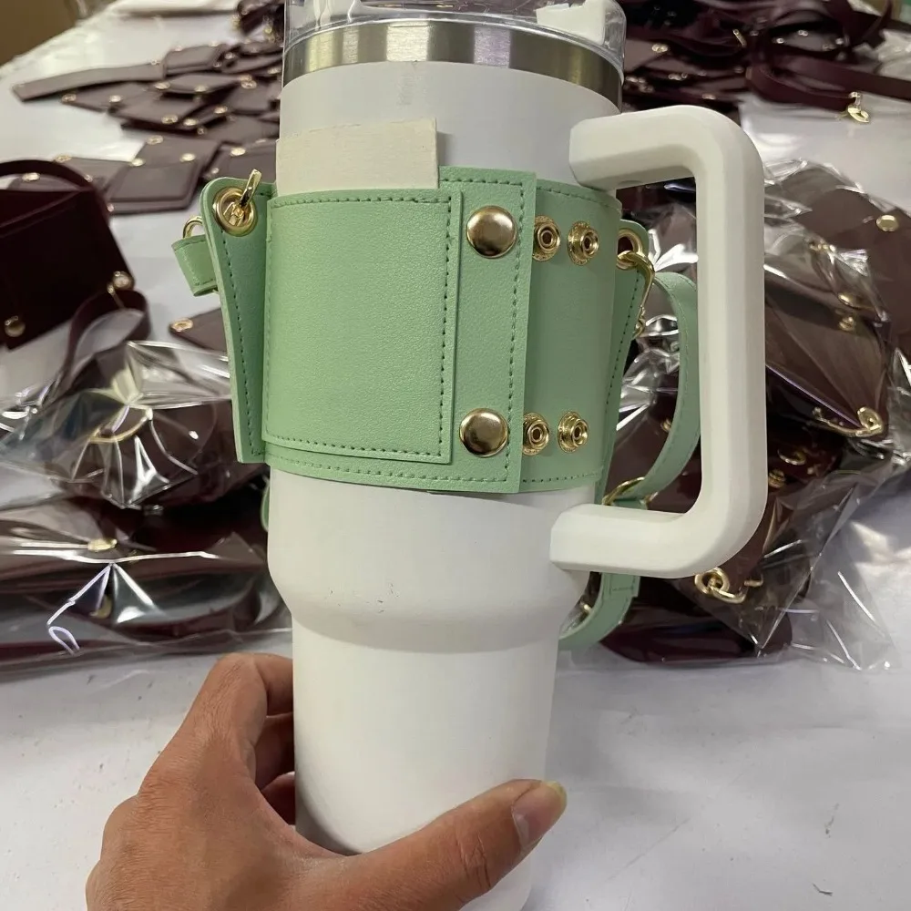 New PU Leather Water Bottle Carrier Adjustable with Strap Water Bottle Holder Bottle Sling Holder For 30oz & 40oz Tumbler
New PU Leather Water Bottle Carrier Adjustable with Strap Water Bottle Holder Bottle Sling Holder For 30oz & 40oz Tumbler