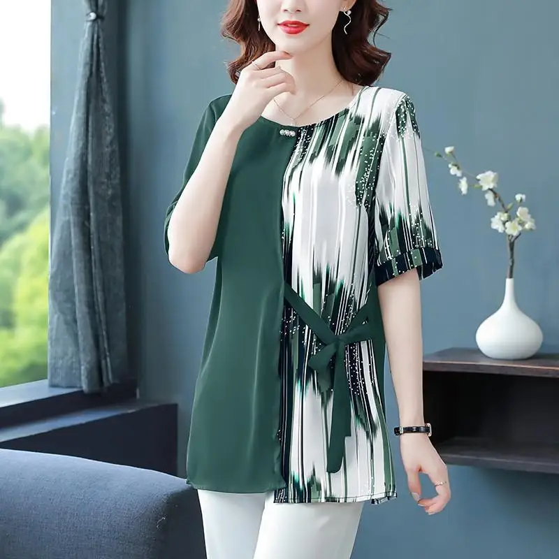 Oversized Summer All-match Printing Chiffon O-neck Short Sleeve Blouse Ladies Temperament Patchwork Loose Shirts Women Clothing
Oversized Summer All-match Printing Chiffon O-neck Short Sleeve Blouse Ladies Temperament Patchwork Loose Shirts Women Clothing