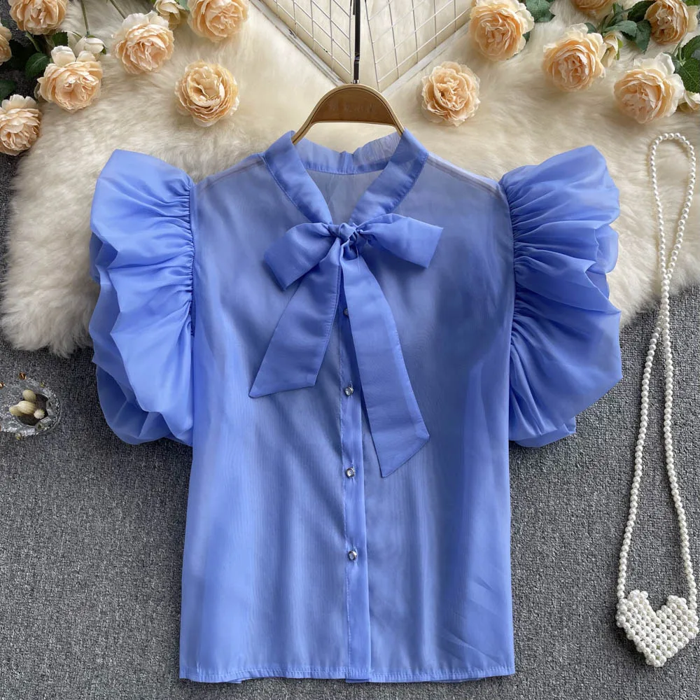 Korean Chic French Short Flying Sleeve Bow Tie of Thin Loose Fashion Shirt Women New Summer Solid Color Blouse Tops G918
Korean Chic French Short Flying Sleeve Bow Tie of Thin Loose Fashion Shirt Women New Summer Solid Color Blouse Tops G918