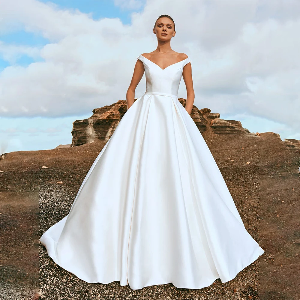 Simple V-neck Satin Wedding Dresses Belt Handmake Lace Princess A-Line Court Train Bride Grown Button Vestido De Noiva
Simple V-neck Satin Wedding Dresses Belt Handmake Lace Princess A-Line Court Train Bride Grown Button Vestido De Noiva