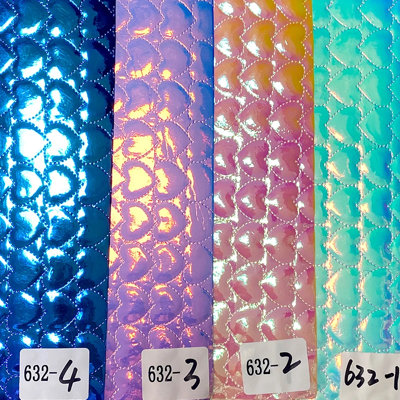 Heart Shape Pattern Embossed PU Holographic Metallic Dichroic Faux Leather Fabric Sheet for Shoe/Bag/Handbag/Craft
Heart Shape Pattern Embossed PU Holographic Metallic Dichroic Faux Leather Fabric Sheet for Shoe/Bag/Handbag/Craft