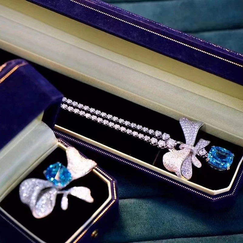 Женский ювелирный комплект из кольца и кольца, из серебра 925 пробы с бантиком 
Женский ювелирный комплект из кольца и кольца, из серебра 925 пробы с бантиком