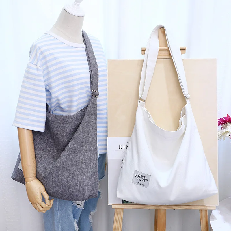 

Korean canvas bag fashionable women simple large capacity hand bill of lading shoulder cross versatile retro canvas bag