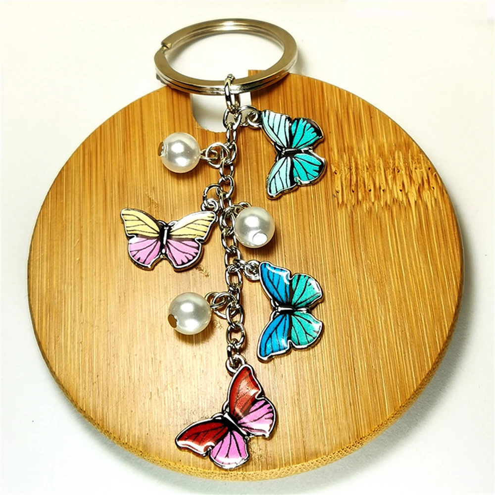 Pearl Enamel Butterfly Keychain For Women Silver Plated Zinc Alloy Key Rings Car Bag Key Holder Jewelry Accessories
Pearl Enamel Butterfly Keychain For Women Silver Plated Zinc Alloy Key Rings Car Bag Key Holder Jewelry Accessories