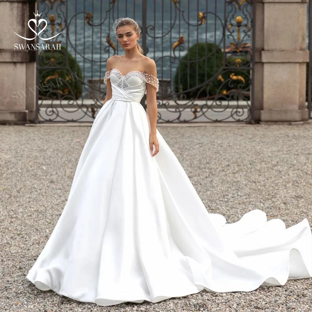 Off the Shoulder Wedding Dress 2024 Sweetheart Sleeveless Pearls Princess Bride Gown SwanSarah P271 Plus Size Vestido De Novia
Off the Shoulder Wedding Dress 2024 Sweetheart Sleeveless Pearls Princess Bride Gown SwanSarah P271 Plus Size Vestido De Novia