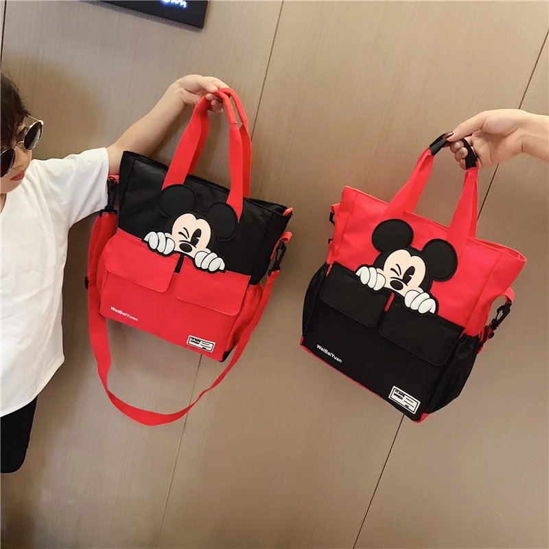 Disney New Student Handbag Carry Book Bag Canvas Children's Bag School Bag Men And Women Travel Bag Bolsa Feminina Shoulder Bag
Disney New Student Handbag Carry Book Bag Canvas Children's Bag School Bag Men And Women Travel Bag Bolsa Feminina Shoulder Bag