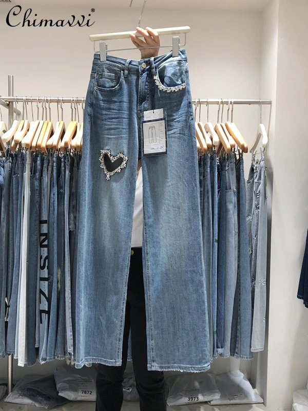 2022 Spring Summer New European Fashion Streetwear Diamond Straight-Leg Denim Pants Women Personality Hollowed Heart Shape Jeans
2022 Spring Summer New European Fashion Streetwear Diamond Straight-Leg Denim Pants Women Personality Hollowed Heart Shape Jeans