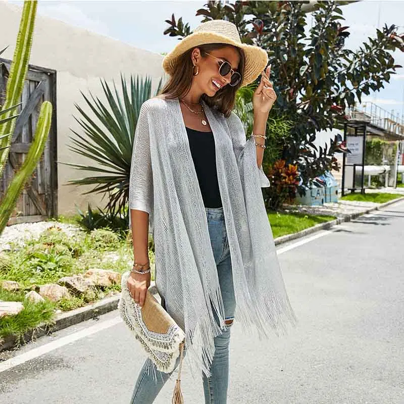 

2022 Summer New Women's Solid Color Sexy Beach Top Bikini Jacket Sexy Fringed Shawl Knitted Wind Cloak Style Sunscreen Blouse