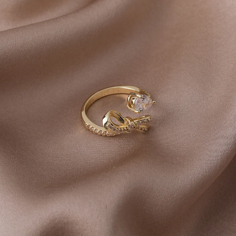 Minar Delicate Shiny CZ Stone Bowknot Charm Rings for Women Gold Color Copper Open Adjusting Ring Temperament Bridal Accessories
Minar Delicate Shiny CZ Stone Bowknot Charm Rings for Women Gold Color Copper Open Adjusting Ring Temperament Bridal Accessories