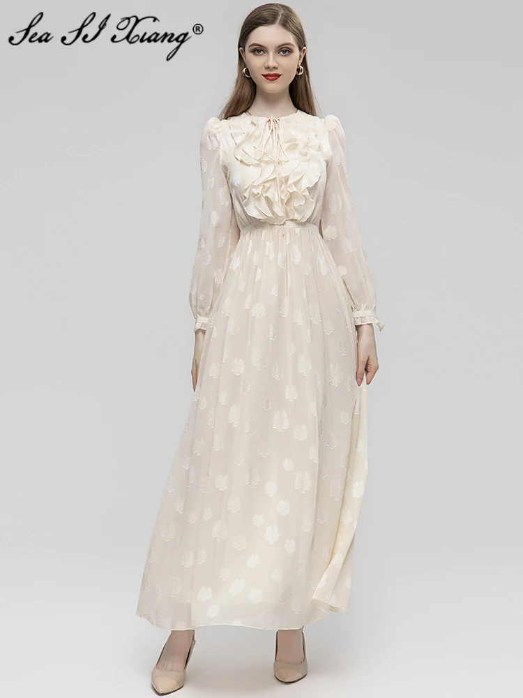 Женское жаккардовое платье с рукавами-фонариками и оборками 
Женское жаккардовое платье с рукавами-фонариками и оборками