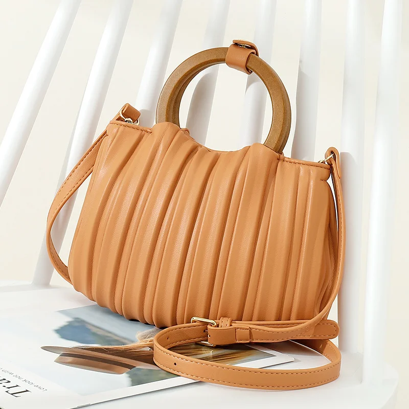 Designer Clutches Women's Top Handle Bag Pleated Shell Shoulder Crossbody Bags for Women New Luxury Brand Solid Tote Handbag
Designer Clutches Women's Top Handle Bag Pleated Shell Shoulder Crossbody Bags for Women New Luxury Brand Solid Tote Handbag