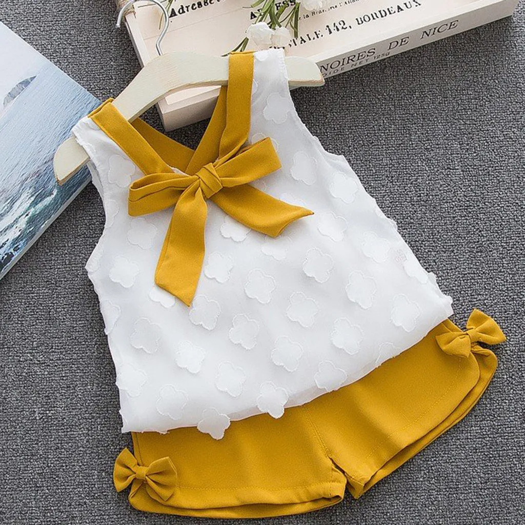 Summer Children's Clothing Girls Solid Sleeveless Bowknot Vest Tops Shorts Toddler Baby Outfit Set Fashion V-Neck Baby Clothes
Summer Children's Clothing Girls Solid Sleeveless Bowknot Vest Tops Shorts Toddler Baby Outfit Set Fashion V-Neck Baby Clothes