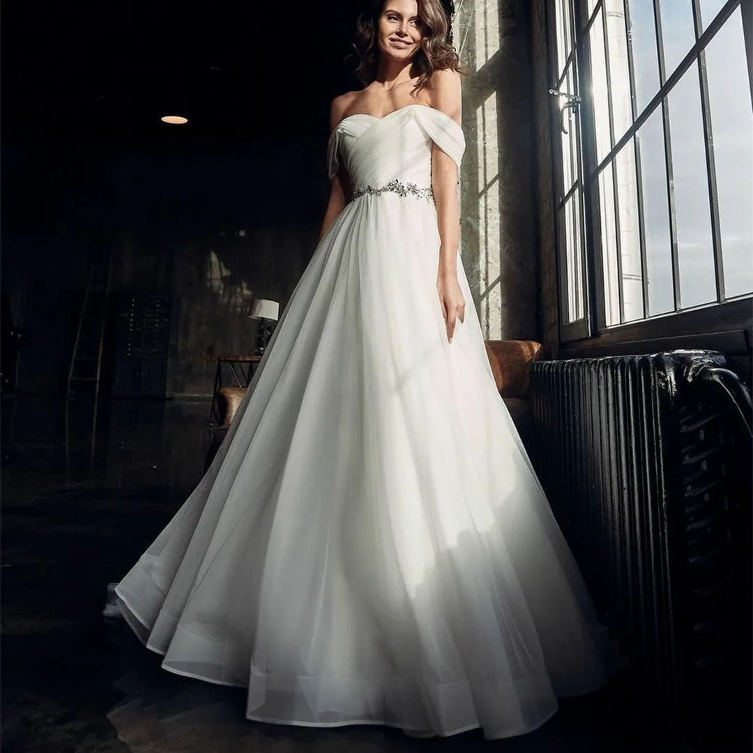Elegant Long Tulle Off Shoulder Beaded Wedding Dresses A-Line Split Lace Up Back Vestido de Novia Bridal Gowns Custom for Women
Elegant Long Tulle Off Shoulder Beaded Wedding Dresses A-Line Split Lace Up Back Vestido de Novia Bridal Gowns Custom for Women