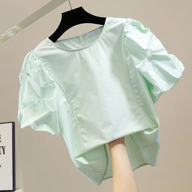 2022 Summer Short Sleeve Shirts Woman Beads Vintage Round Neck Pullover Blusas Female Loose All-Matching Top Solid Color 
2022 Summer Short Sleeve Shirts Woman Beads Vintage Round Neck Pullover Blusas Female Loose All-Matching Top Solid Color