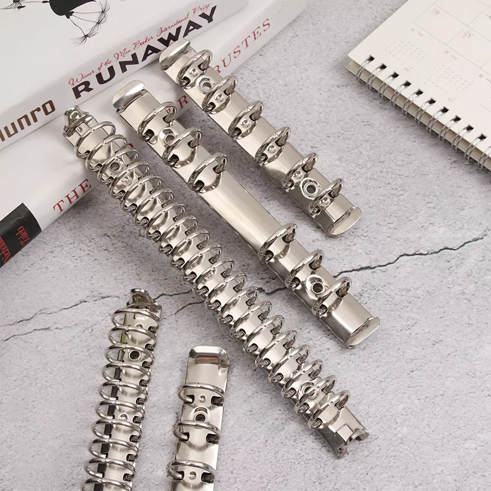 1 PC A4/B5/A5/A6/A7 Refillable Metal Spiral Rings Binder Clip Notebook Binding Hoops Loose-leaf File Folder Clip Stationery
1 PC A4/B5/A5/A6/A7 Refillable Metal Spiral Rings Binder Clip Notebook Binding Hoops Loose-leaf File Folder Clip Stationery