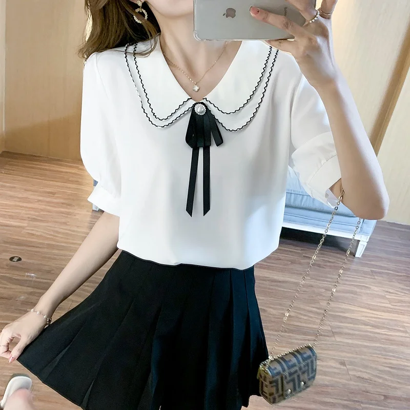 Женская шифоновая блузка с кукольным воротником, Свободный Топ в Корейском стиле, лето 2022
Женская шифоновая блузка с кукольным воротником, Свободный Топ в Корейском стиле, лето 2022