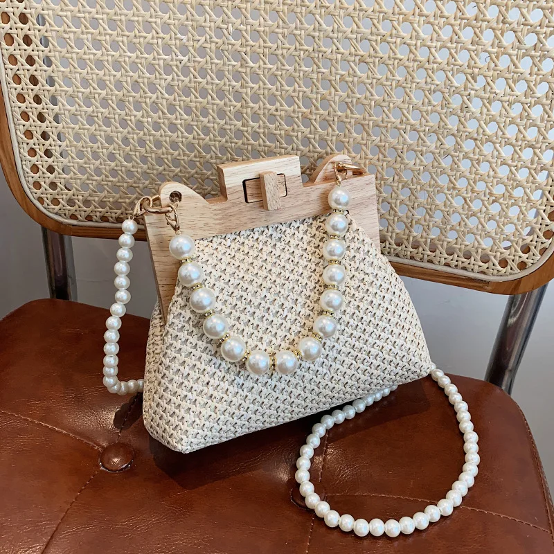 Popular Fashionable Bags for Women Simple Straw Woven Pearl Chain Handbag Spring 2023 Messenger Trend Removable Shoulder Strap
Popular Fashionable Bags for Women Simple Straw Woven Pearl Chain Handbag Spring 2023 Messenger Trend Removable Shoulder Strap
