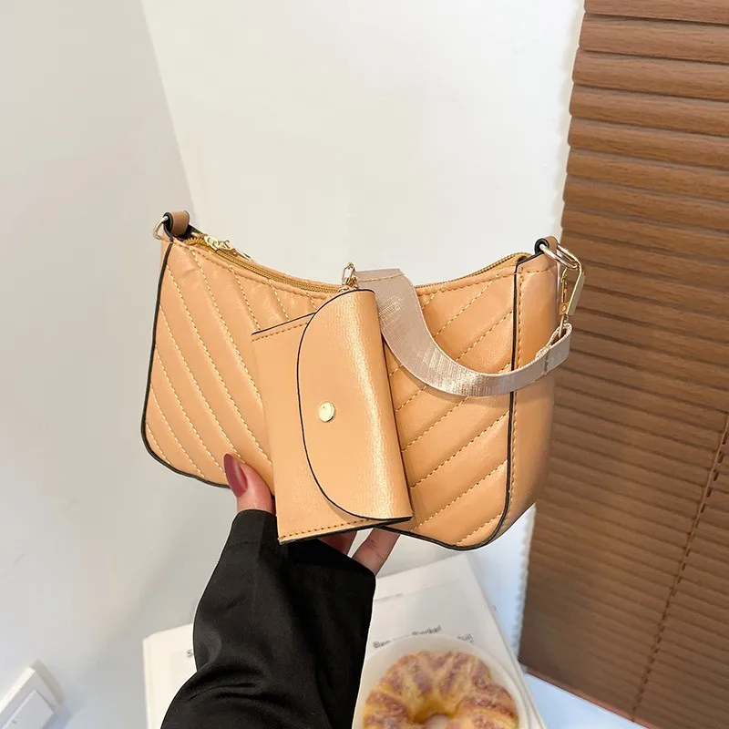 Комплект из 2 предметов, летняя новая женская сумка через плечо, роскошные сумки через плечо на молнии, вместительные женские сумочки, модный мини-кошелек
Комплект из 2 предметов, летняя новая женская сумка через плечо, роскошные сумки через плечо на молнии, вместительные женские сумочки, модный мини-кошелек