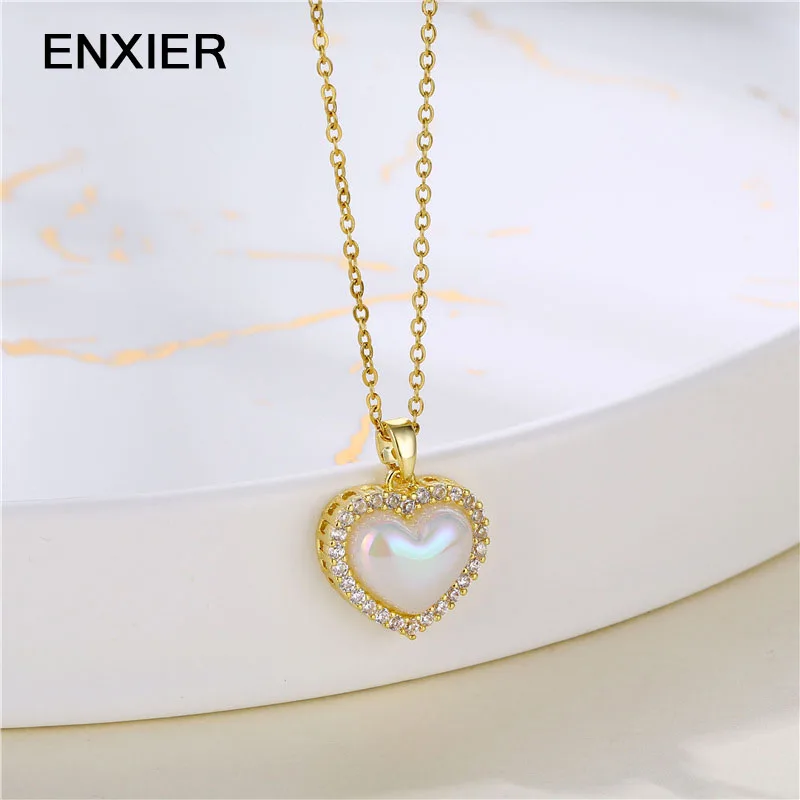 ENXIER Love Heart Pearl Zircon Pendents Necklace For Women Stainless Steel Clavicle Chain Classic Femme Necklaces Jewelry
ENXIER Love Heart Pearl Zircon Pendents Necklace For Women Stainless Steel Clavicle Chain Classic Femme Necklaces Jewelry