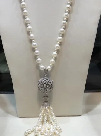 Long sleeved sweater necklace, zircon tassel micro inlay, natural freshwater pearl white 8-9mm and 6mm, fashion jewelry 32“
Long sleeved sweater necklace, zircon tassel micro inlay, natural freshwater pearl white 8-9mm and 6mm, fashion jewelry 32“