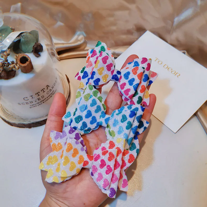 12 шт./лот блестящие банты для волос в форме сердца заколки для девочек ручной работы с бантом русалки заколки для волос заколки принцессы аксессуары для волос 
12 шт./лот блестящие банты для волос в форме сердца заколки для девочек ручной работы с бантом русалки заколки для волос заколки принцессы аксессуары для волос