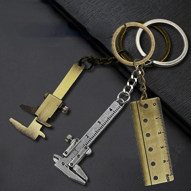 Portable Mini Metal Ruler Vernier Caliper Ruler Key Chain Movable Vernier Caliper Ruler Model Keychain Creative Gift
Portable Mini Metal Ruler Vernier Caliper Ruler Key Chain Movable Vernier Caliper Ruler Model Keychain Creative Gift