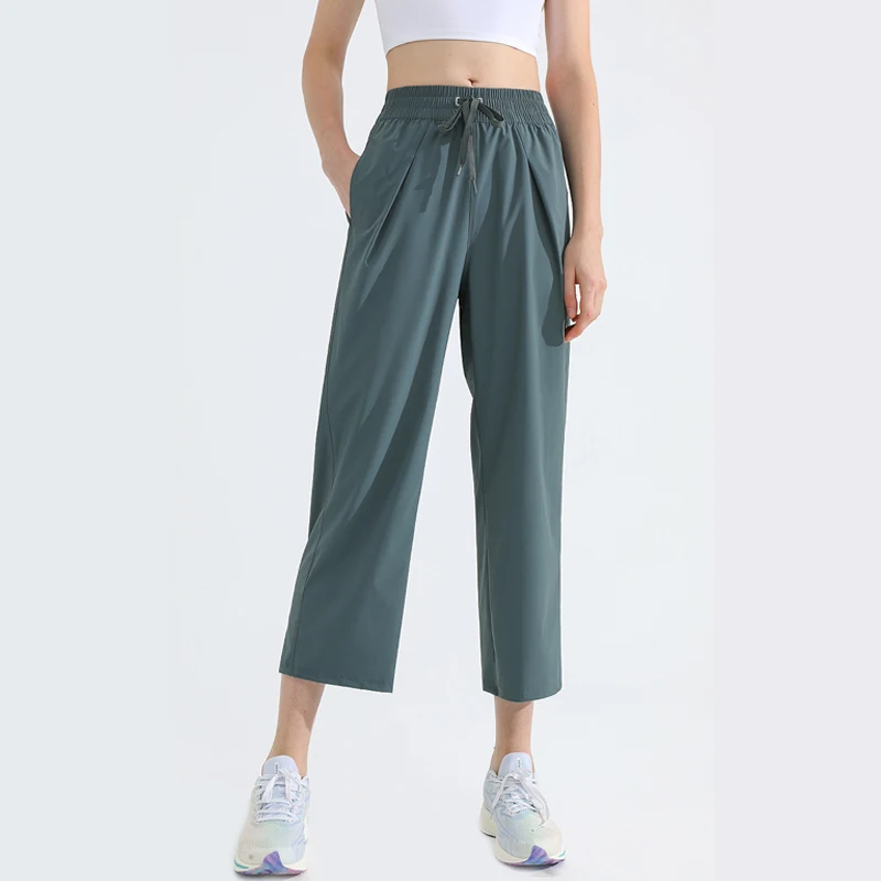 Женские свободные штаны для фитнеса и йоги, Модные Спортивные Повседневные Брюки-Капри с завязкой на талии и широкими штанинами, уличные тренировочные брюки, спортивная одежда
Женские свободные штаны для фитнеса и йоги, Модные Спортивные Повседневные Брюки-Капри с завязкой на талии и широкими штанинами, уличные тренировочные брюки, спортивная одежда