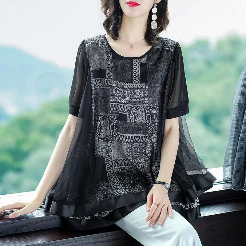 Blouse stitching top women's summer costume 2022 foreign loose printed women's summer o neck wild retro chiffon blouse females
Blouse stitching top women's summer costume 2022 foreign loose printed women's summer o neck wild retro chiffon blouse females